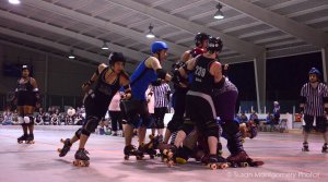 Ann Arbor Roller Derby -  Jammer super move - Shutter speed priority, ISO 3200, 1/500 sec